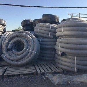 Труба гофрированная дренажная одностенная 160 в геофильтре SN4